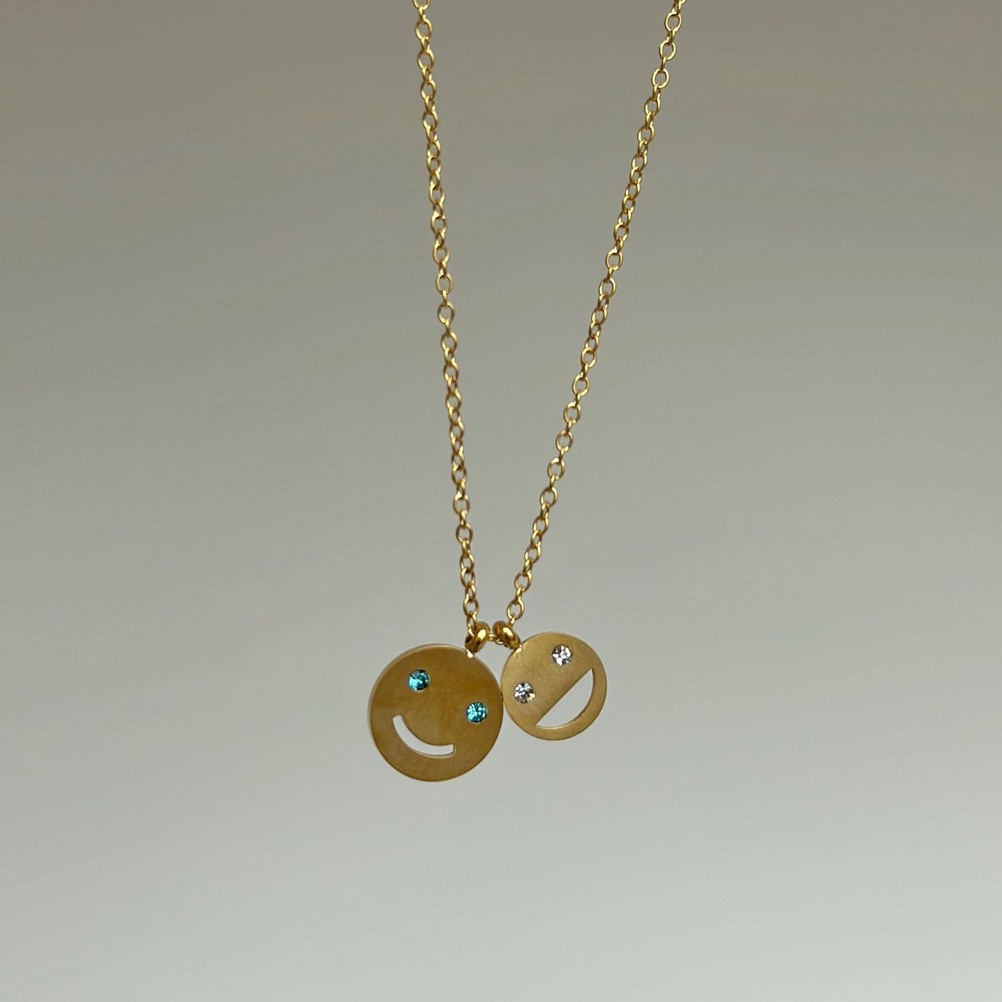 Gold Happy Smiley Blue Diamond Pendant
