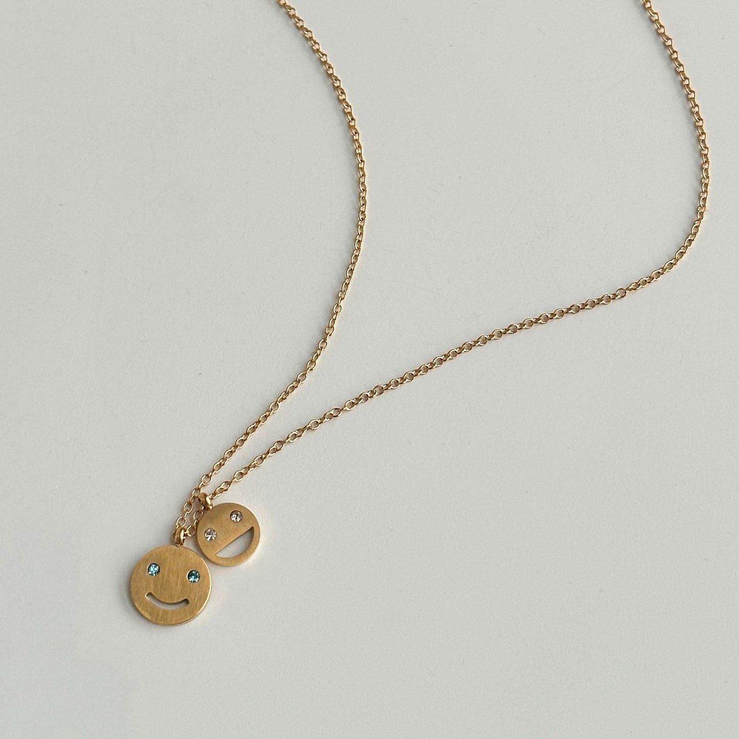 Gold Happy Smiley Blue Diamond Pendant
